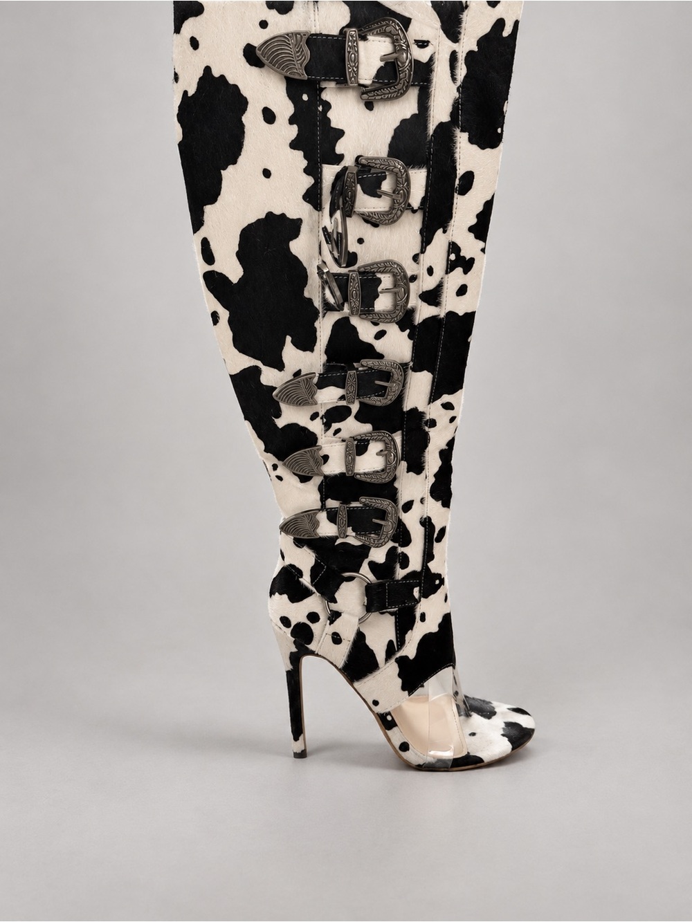 Black & White Cow Print Knee-High Buckle Stiletto Boots